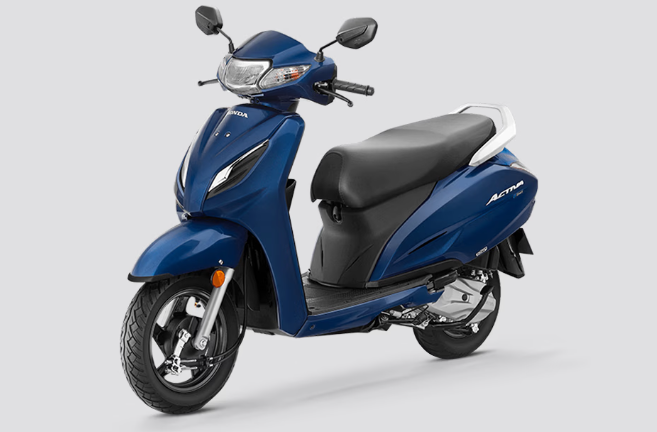 Honda Activa 110 scooter in blue color on display at Mhow showroom